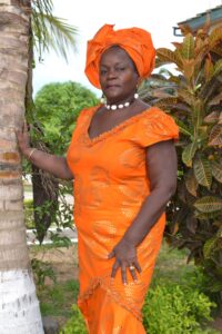 Chairperson in striking African royal-looking apparel